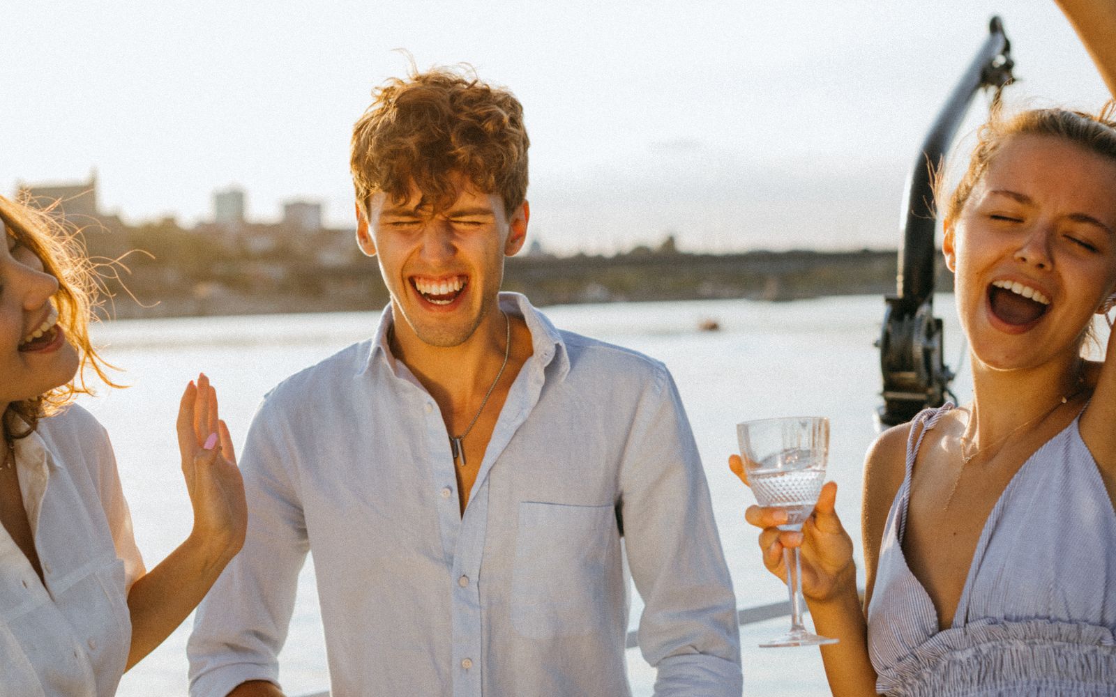 Friends on a sunset boat